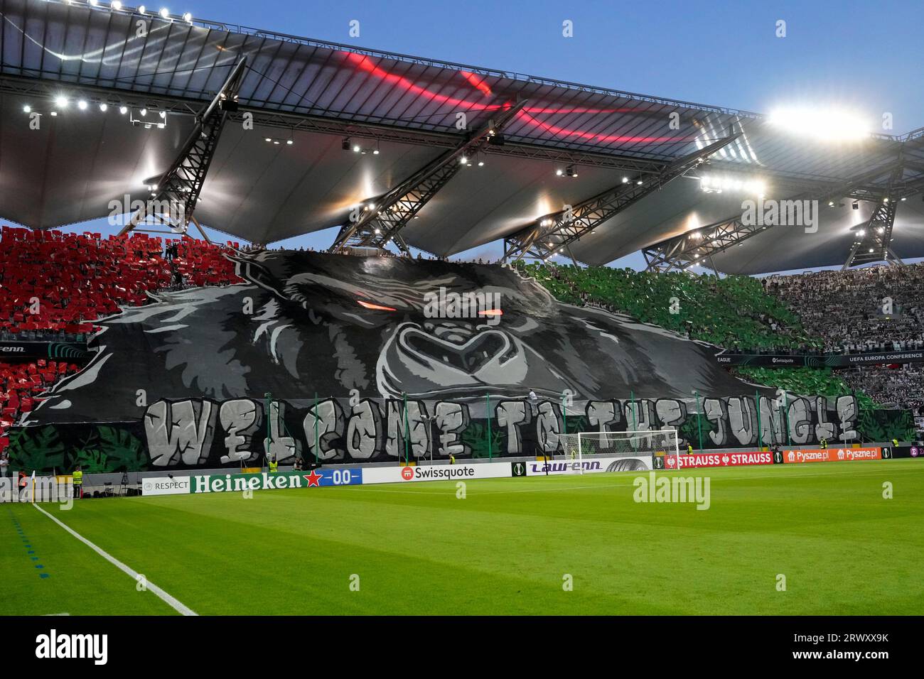 Legia fans unfurl a giant banner on the stands before the Europa Conference  League group E soccer match between Legia and Aston Villa at the Legia  Warsaw Municipal Stadium in Warsaw, Thursday,