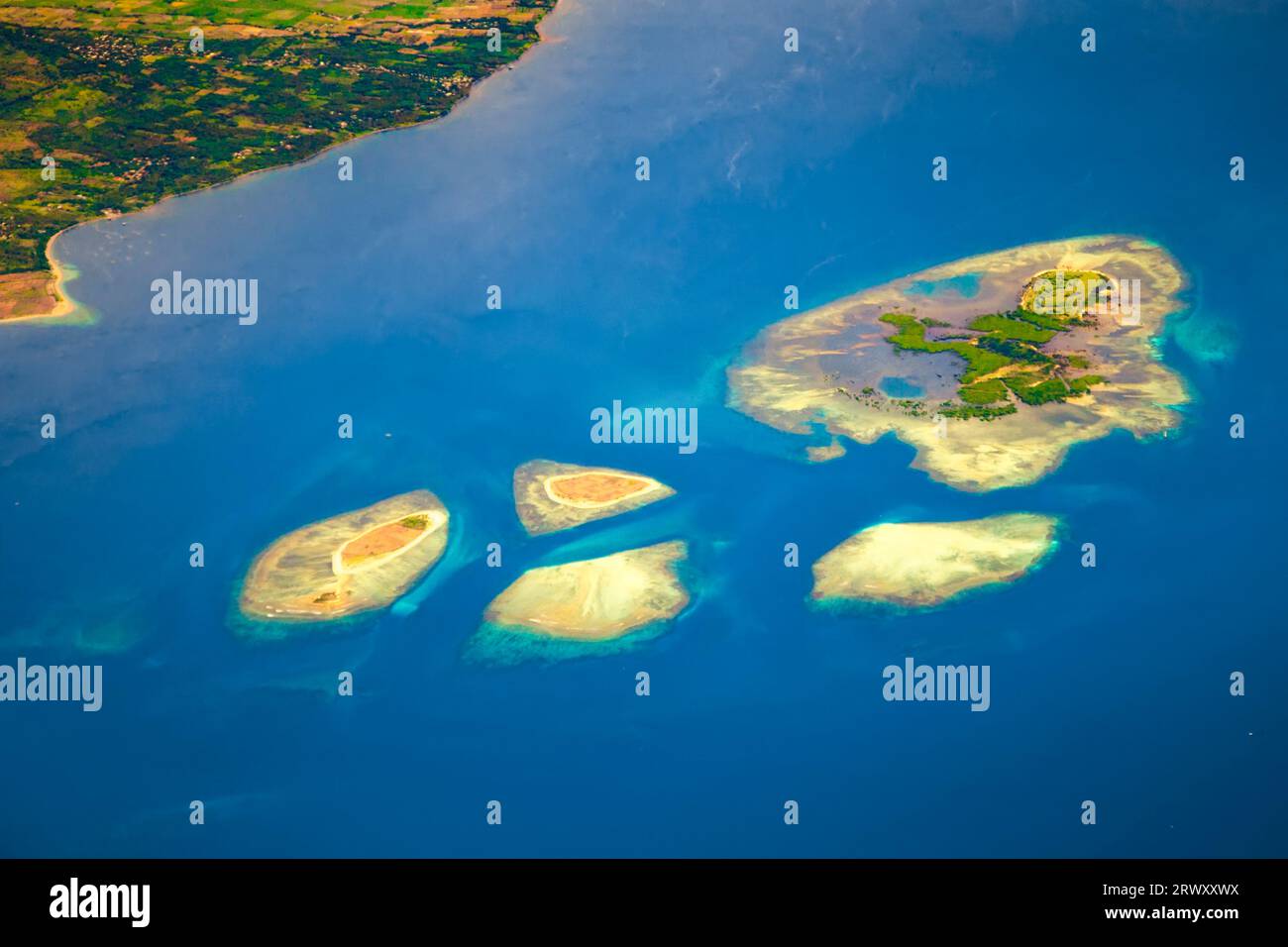 Uninhabited tropical island off the coast of Indonesia. Stock Photo