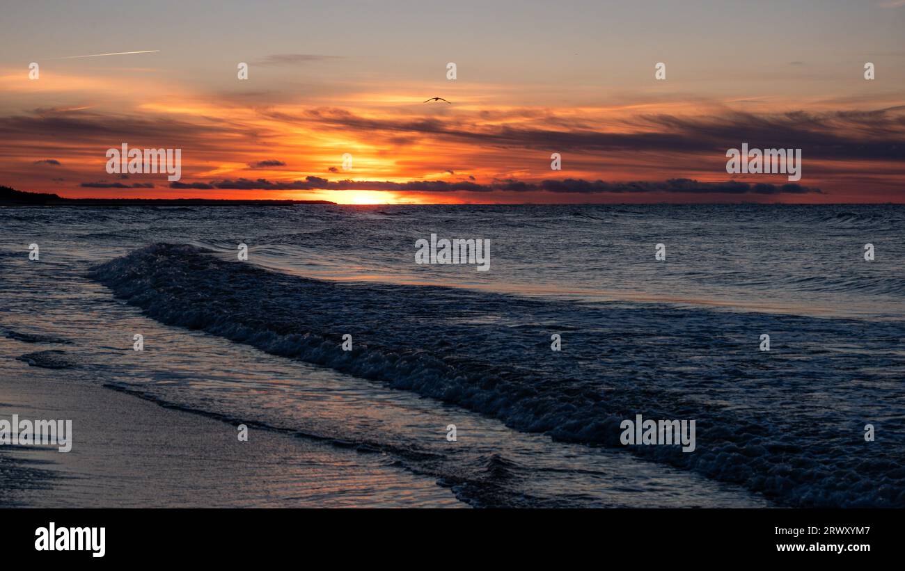 Sunset over the Baltic Sea, dramatic sky Stock Photo - Alamy