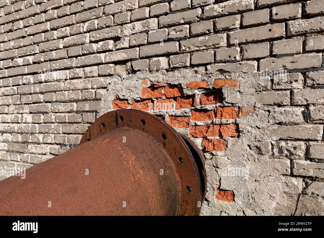 a rusty pipe sticking out of the building Stock Photo Alamy