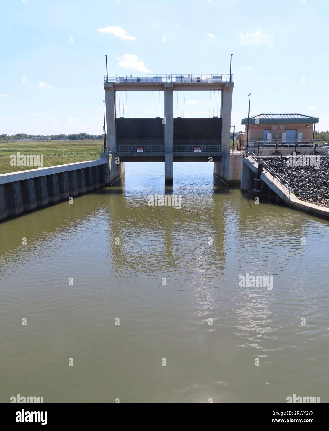 Flood gates, part of a storm protection project, are open on Wednesday,  Sept. 20, 2023, in a section of Middletown, N.J., that was hit hard by  Superstorm Sandy. New Jersey, like places, image size:1061x1390