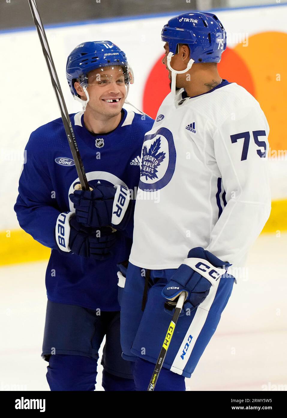Toronto Maple Leafs teammates Max Domi, left, and Ryan Reaves laugh during  NHL hockey training camp in Toronto, Thursday, Sept. 21, 2023. (Nathan  Denette/The Canadian Press via AP Stock Photo - Alamy