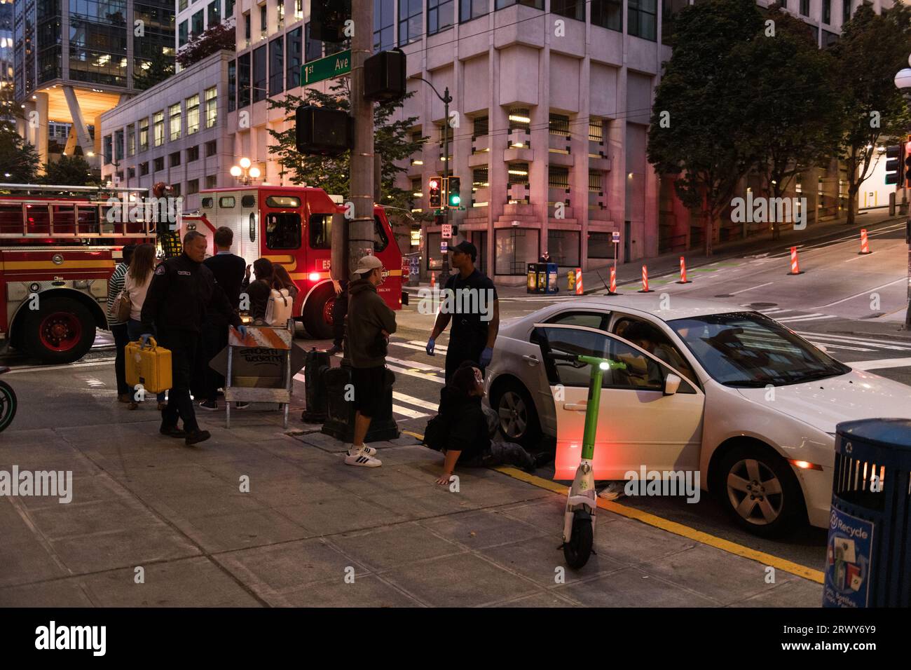 Seattle, USA. 19 Sep, 2023. SFD treating a vehicle vs Lime scooter accident on 1st Ave. Stock Photo