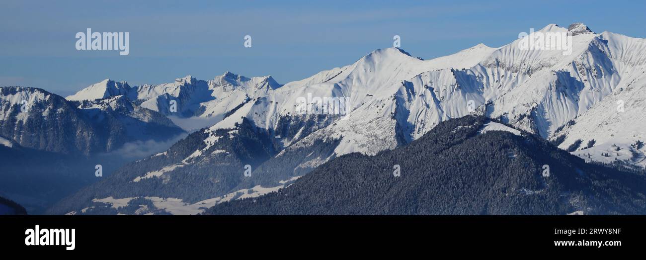 Snow covered mountain range Vanil Noir seen from Horneggli. Stock Photo