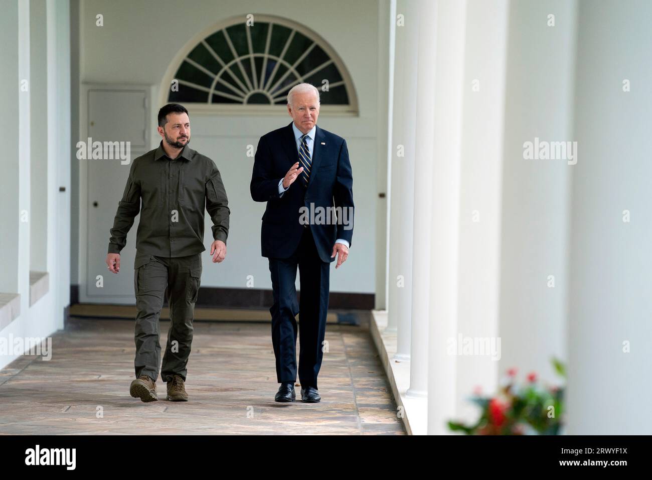 President Joe Biden and Ukrainian President Volodymyr Zelenskyy walk to ...