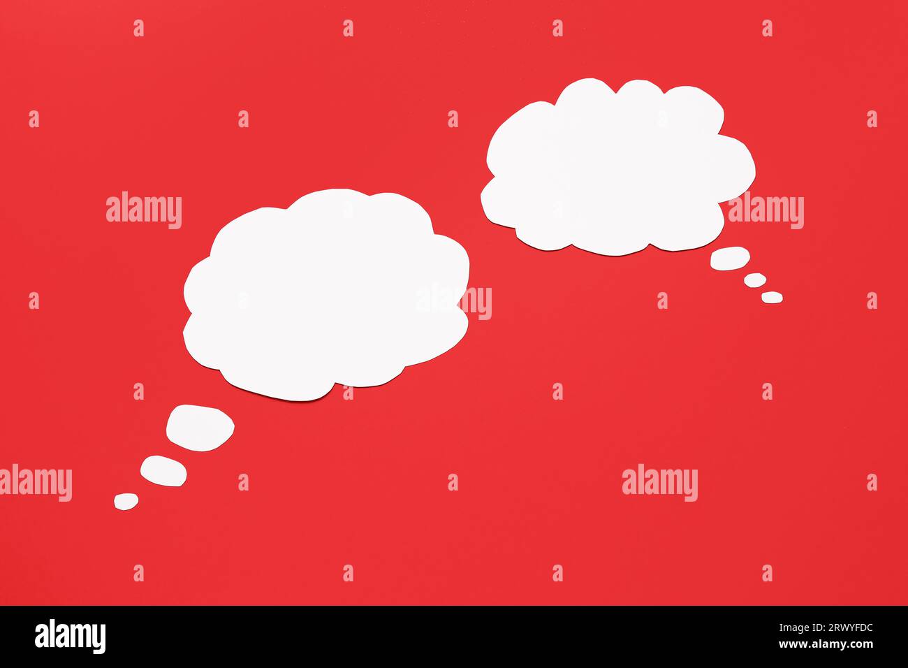 Blank speech bubbles on red background Stock Photo