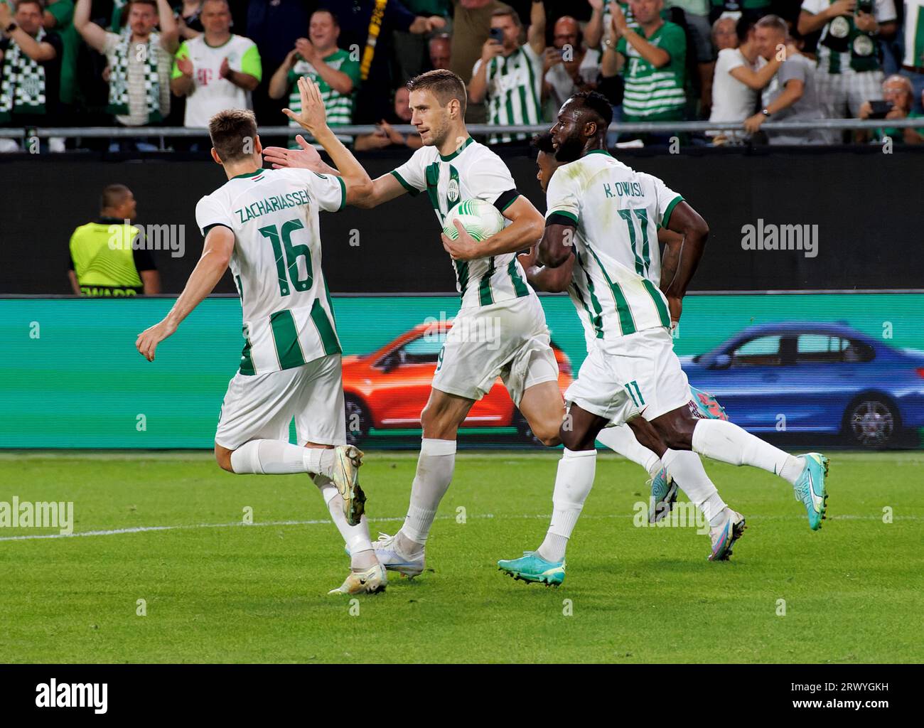 Budapest, Hungary. 31st August, 2023. Barnabas Varga of Ferencvarosi TC  competes for the ball with Nassim Hnid of FK Zalgiris Vilnius during the  UEFA Europa Conference League Play Off Round Second Leg