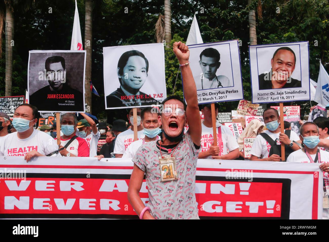 An activist gestures during the demonstration. Extremists marched in Manila to mark the 51st anniversary of the declaration of Martial Law in the Philippines by the late dictator Ferdinand Emmanuel Edralin Marcos Sr. The Martial Law marked as tumultuous phase in Philippine history. Former President Marcos placed the entire Philippines under Martial Law that lasted from September 21, 1972 to January 17, 1981. During that time, Marcos cracked down on dissent and imprisoned thousands of his political critics. The dictator's family, with the power of Ferdinand Marcos Jr., a current Philippine pres Stock Photo