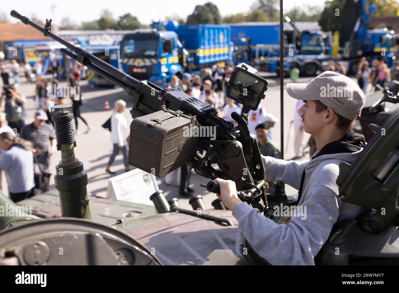 Gornja Radgona, Slovenia. 21st Sep, 2023. A visitor experiences a Tank M-84 during the SOBRA international fair in Gornja Radgona, Slovenia, on Sept. 21, 2023. Slovenia will increase its defense budget, the country's Minister of Defense Marjan Sarec said at the biennial four-day SOBRA international fair focusing on the areas of defense, security, protection and rescue that opened on Thursday. Credit: Zeljko Stevanic/Xinhua/Alamy Live News Stock Photo