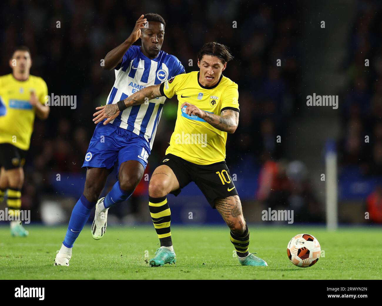 Brighton and Hove, UK. 21st Sep, 2023. Danny Welbeck of Brighton and Hove Albion and Steven Zuber of AEK Athens challenge for the ball during the UEFA Europa League match at the AMEX Stadium, Brighton and Hove. Picture credit should read: Paul Terry/Sportimage Credit: Sportimage Ltd/Alamy Live News Stock Photo