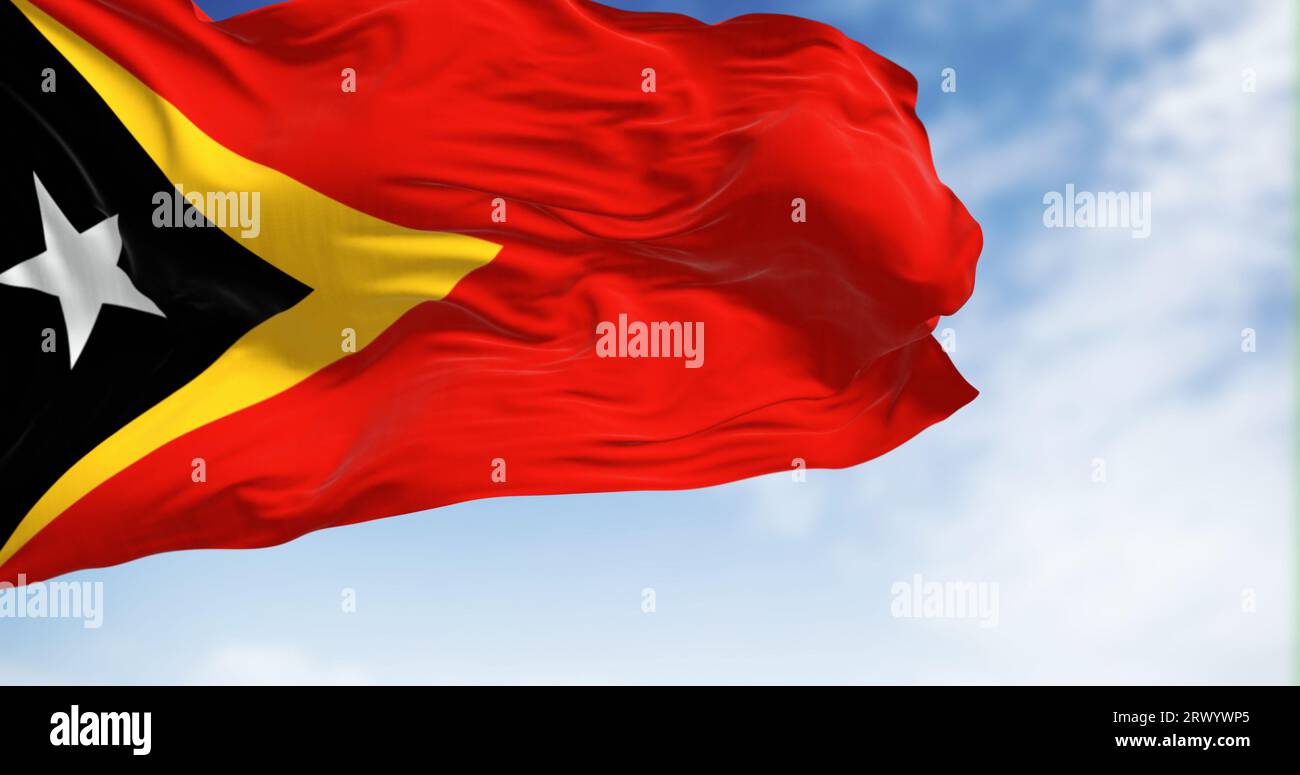 National flag of East Timor waving in the wind on a clear day. 3d ...