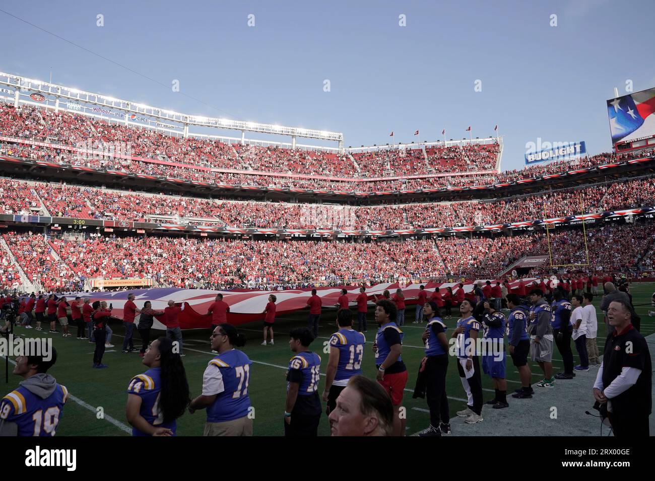 A flag is presented on the field of Levi's Stadium during the national  anthem before an NFL football game between the San Francisco 49ers and the  New York Giants in Santa Clara,