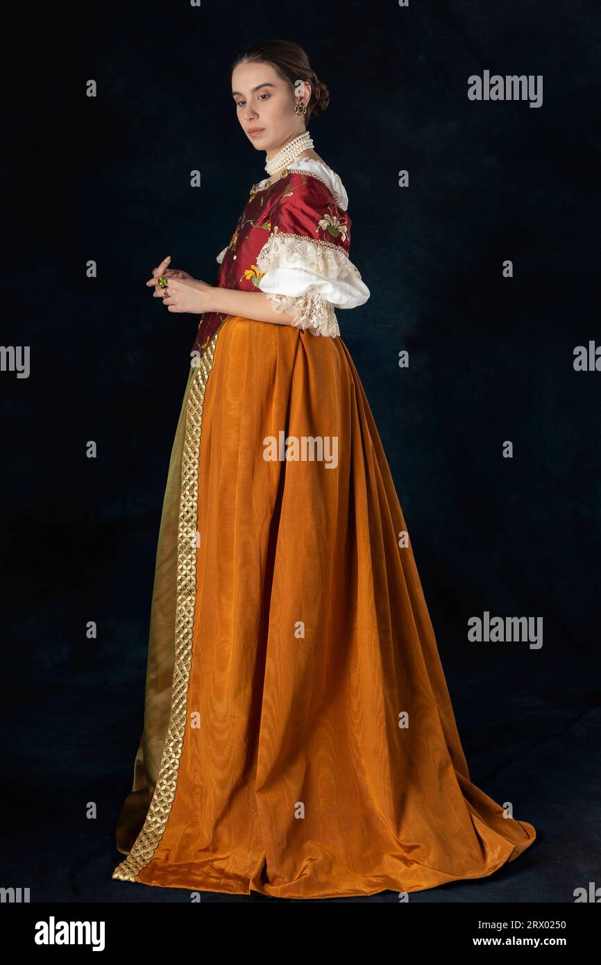 Woman wearing a historical costume from the Renaissance, Restoration, or early Georgian period with an embroidered bodice Stock Photo