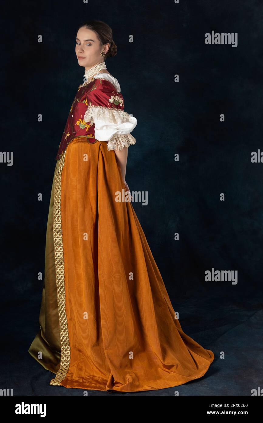 Woman wearing a historical costume from the Renaissance, Restoration, or early Georgian period with an embroidered bodice Stock Photo