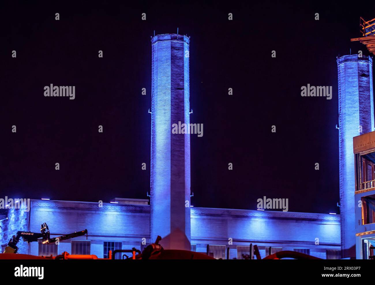 Power Station chimneys floodlit at night Stock Photo - Alamy
