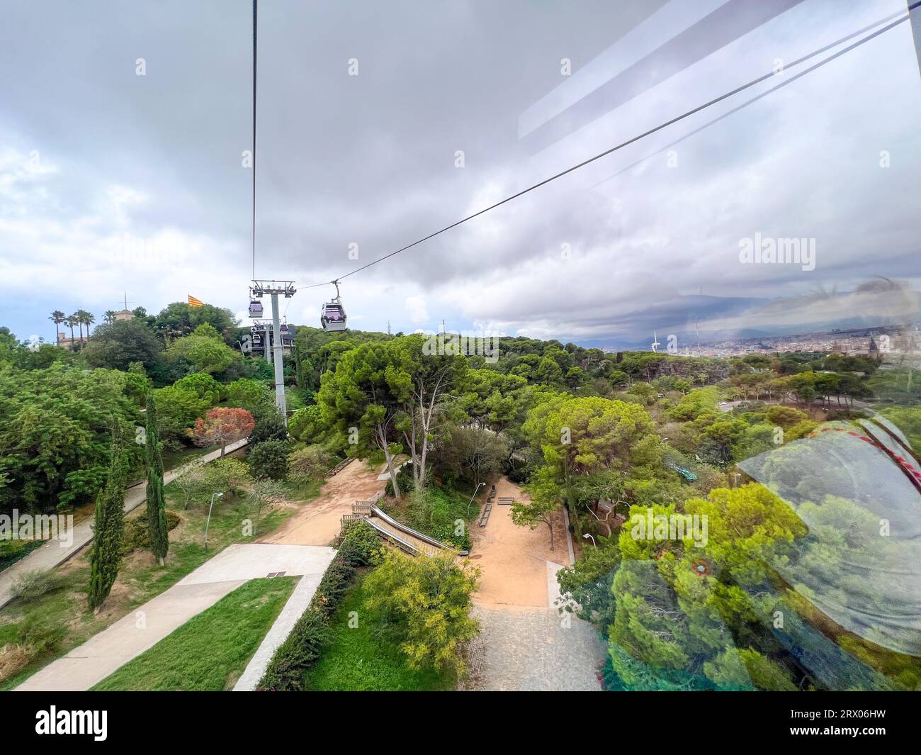 Barcelona skyline is seen from Montjuic Cable Car in Spain Stock Photo ...