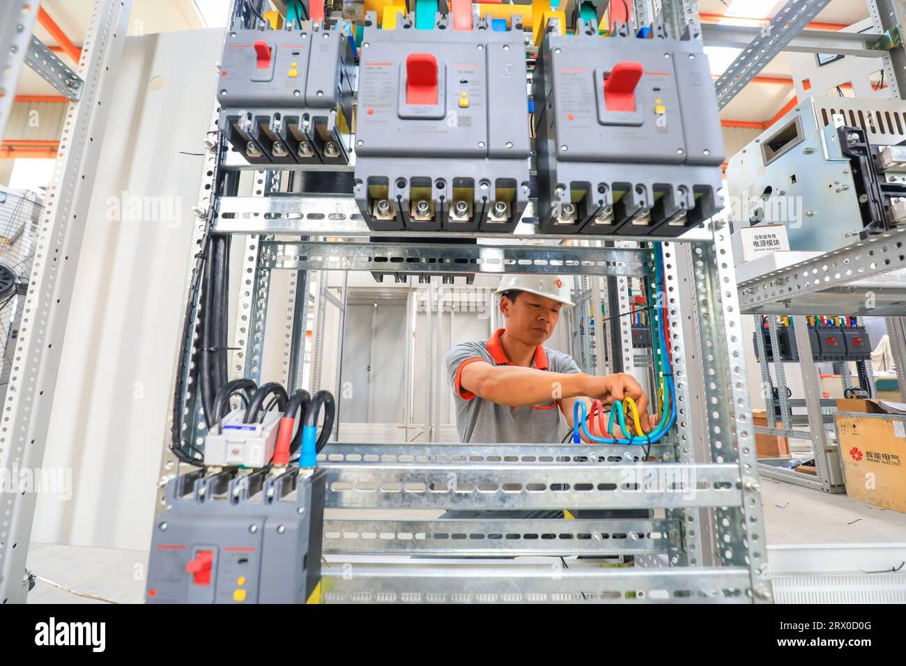Luannan County, China August 10, 2023 Technical workers assembling