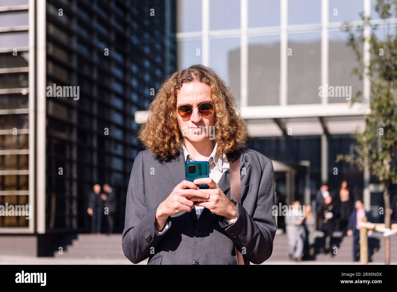 young business man using mobile phone Stock Photo