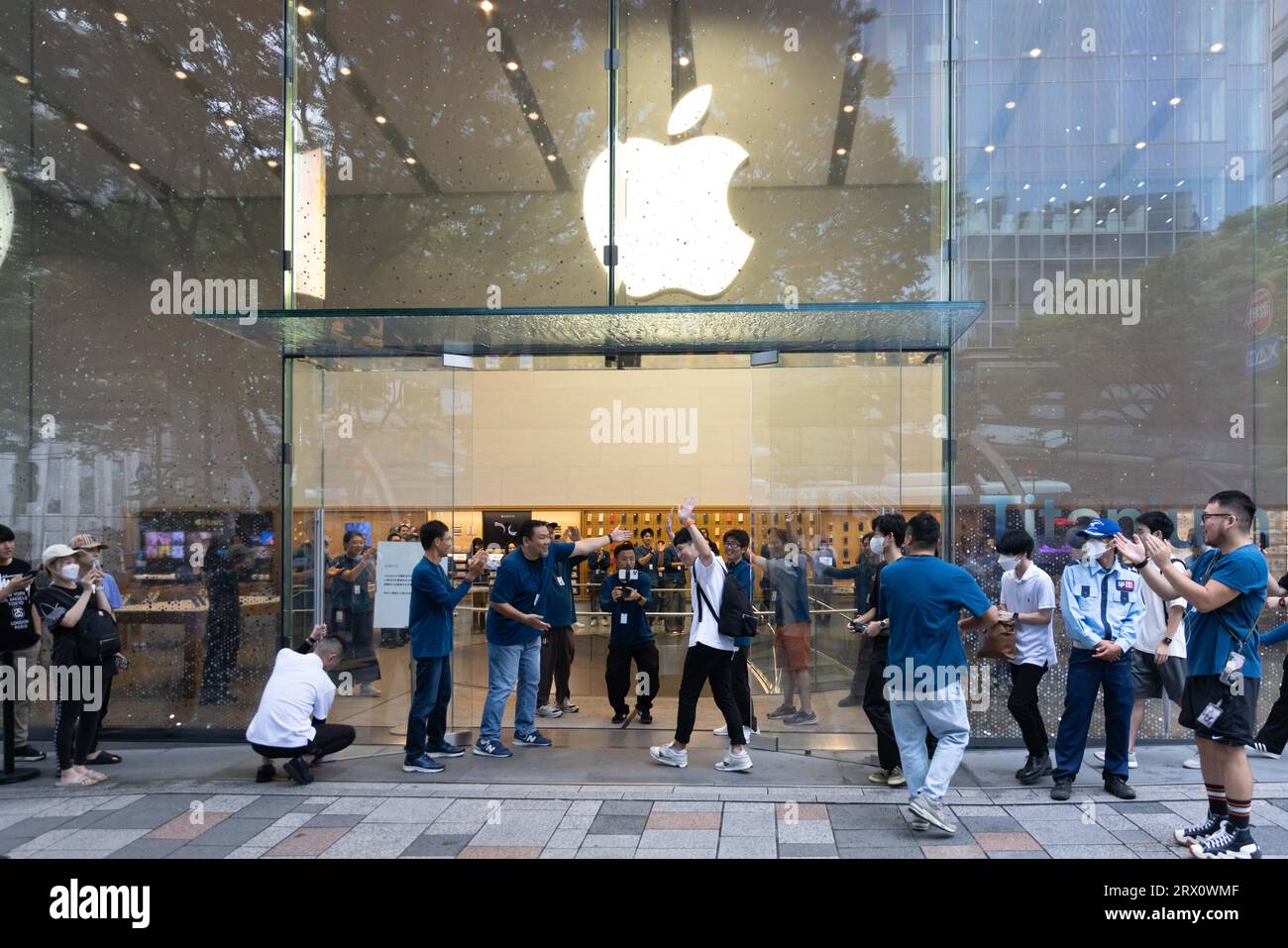 First customers walk into the Apple store in Omotesando, Tokyo on the