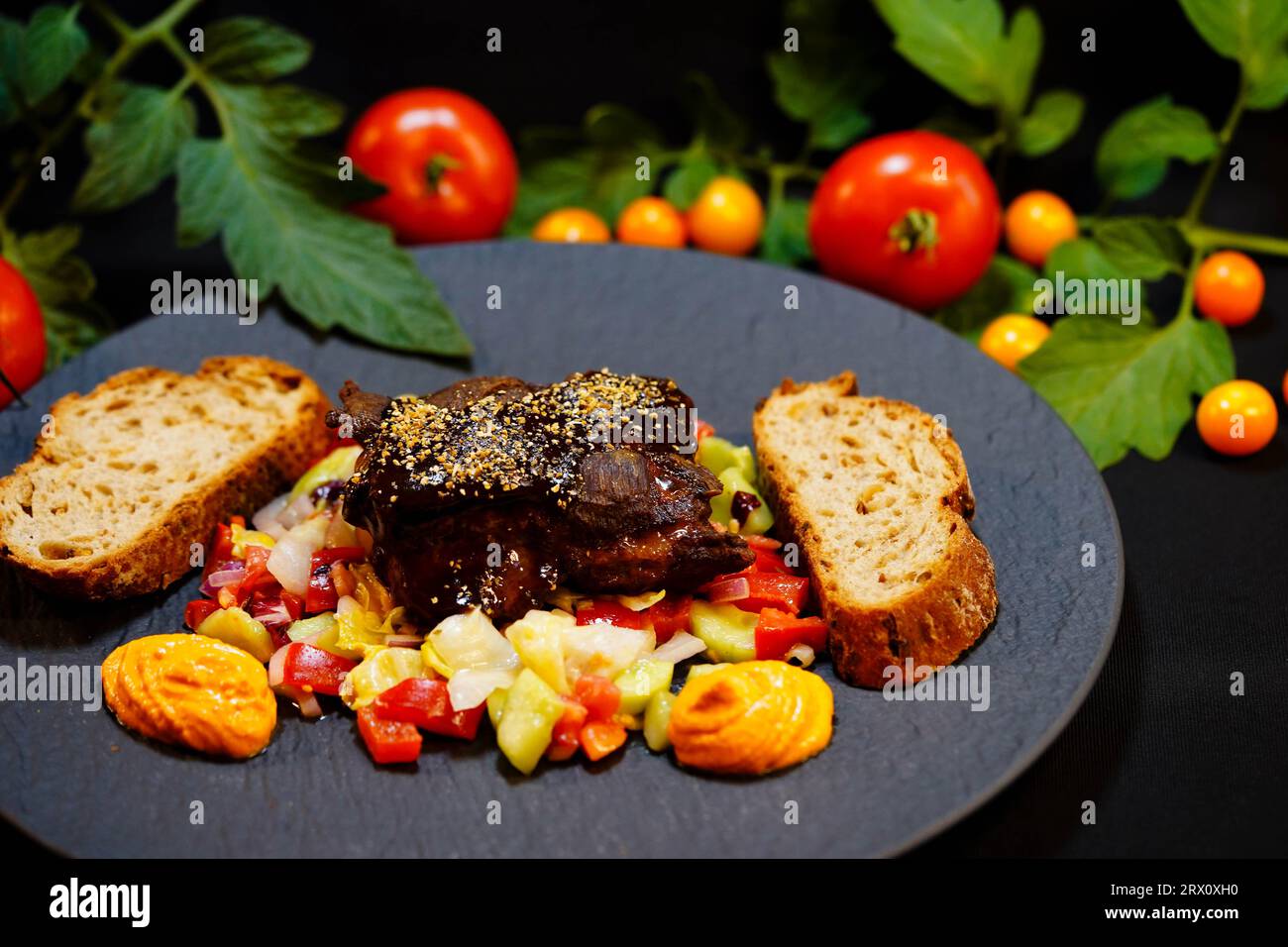 Veal cheeks with a fresh salad Stock Photo Alamy