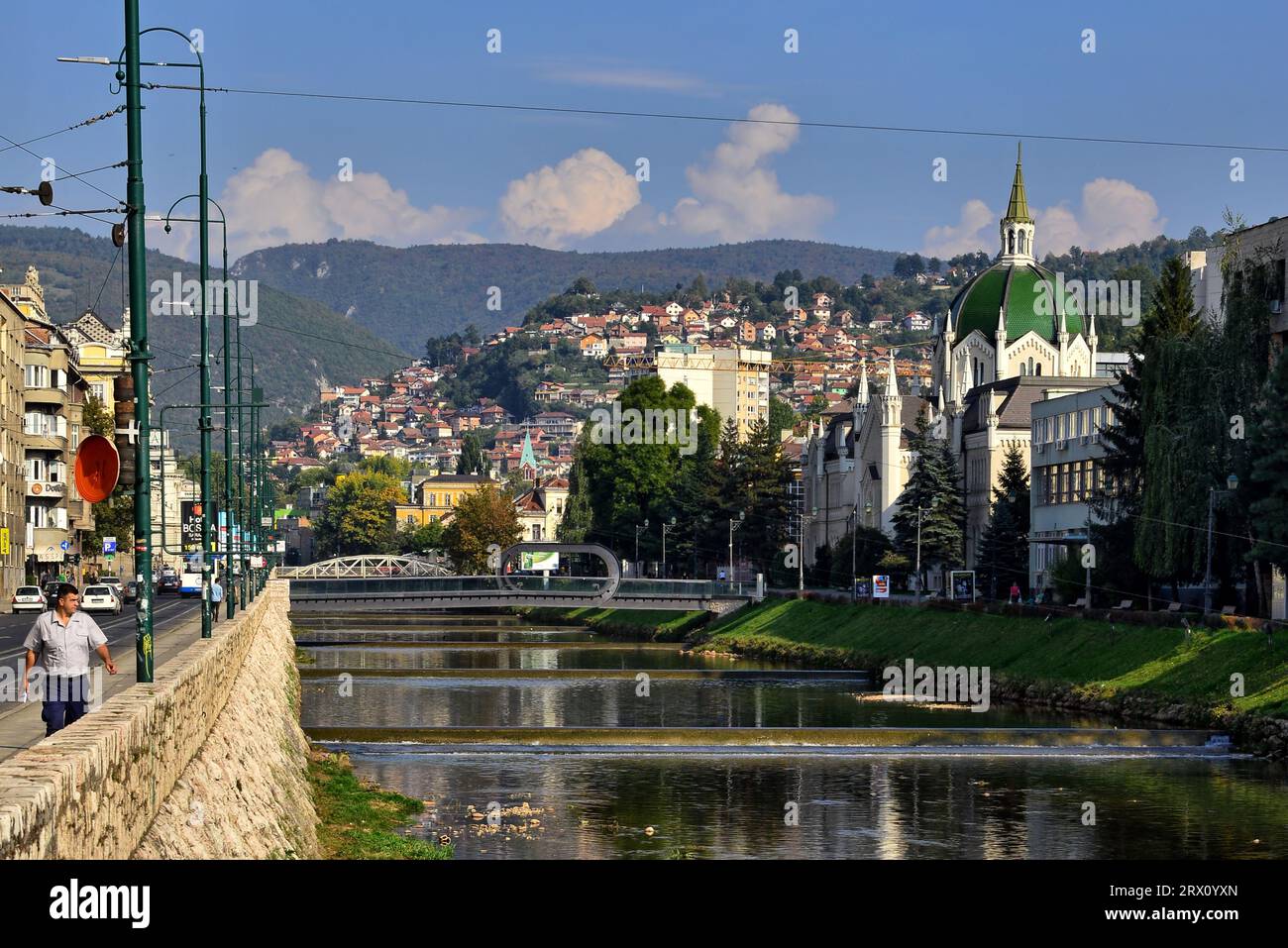View of Festina Lente Bridge and the Academy of Fine Arts from the banks of Miljacka River that separated the two sides in the Bosnian War Stock Photo