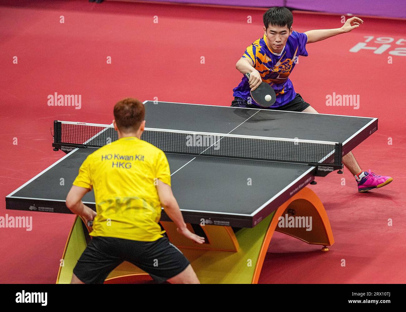 Hangzhou, China's Zhejiang Province. 22nd Sep, 2023. Ser-Od Gankhuyag (top) of Mongolia competes against Ho Kwan Kit of China's Hong Kong during the men's team preliminary group E table tennis match between Mongolia and China's Hong Kong at the 19th Asian Games in Hangzhou, east China's Zhejiang Province, Sept. 22, 2023. Credit: Sun Fei/Xinhua/Alamy Live News Stock Photo