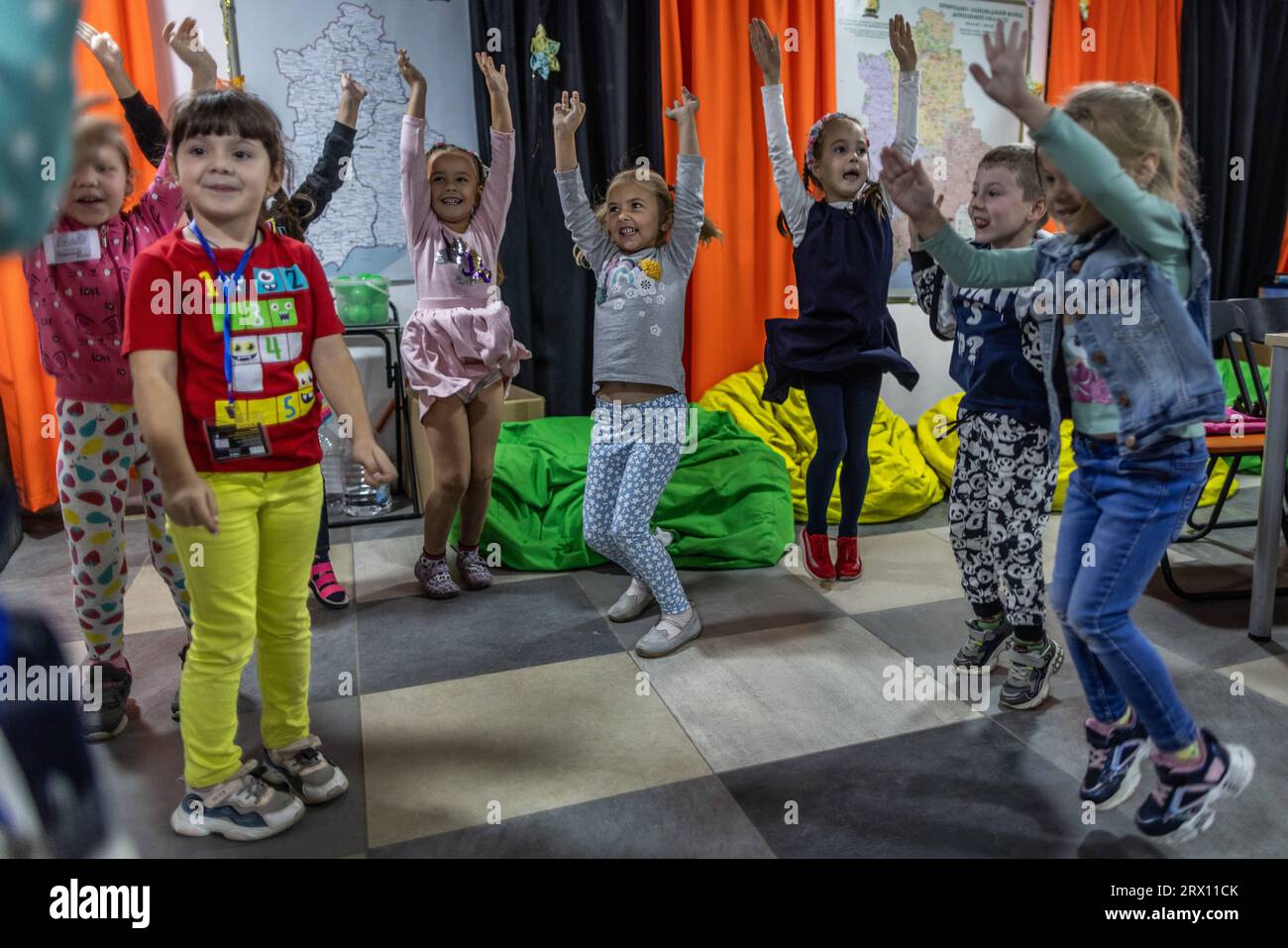 Kramatorsk, Ukraine. 19th Sep, 2023. Ukrainian children dance at the Tato Hub in Kramatorsk, a volunteer facility for children left in the war zone. Many children come from localities that are hot spots of the war. Their families have rescued themselves from the fighting to the small town of Kramatorsk. (to dpa 'The Tato Hub wants to stabilize wounded children's souls in Ukraine') Credit: Oliver Weiken/dpa/Alamy Live News Stock Photo