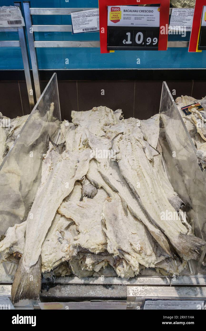 Bacalhau (dried and salted codfish) on sale in a Portuguese supermarket. It is a great delicacy in Portugal, served in many different ways Stock Photo