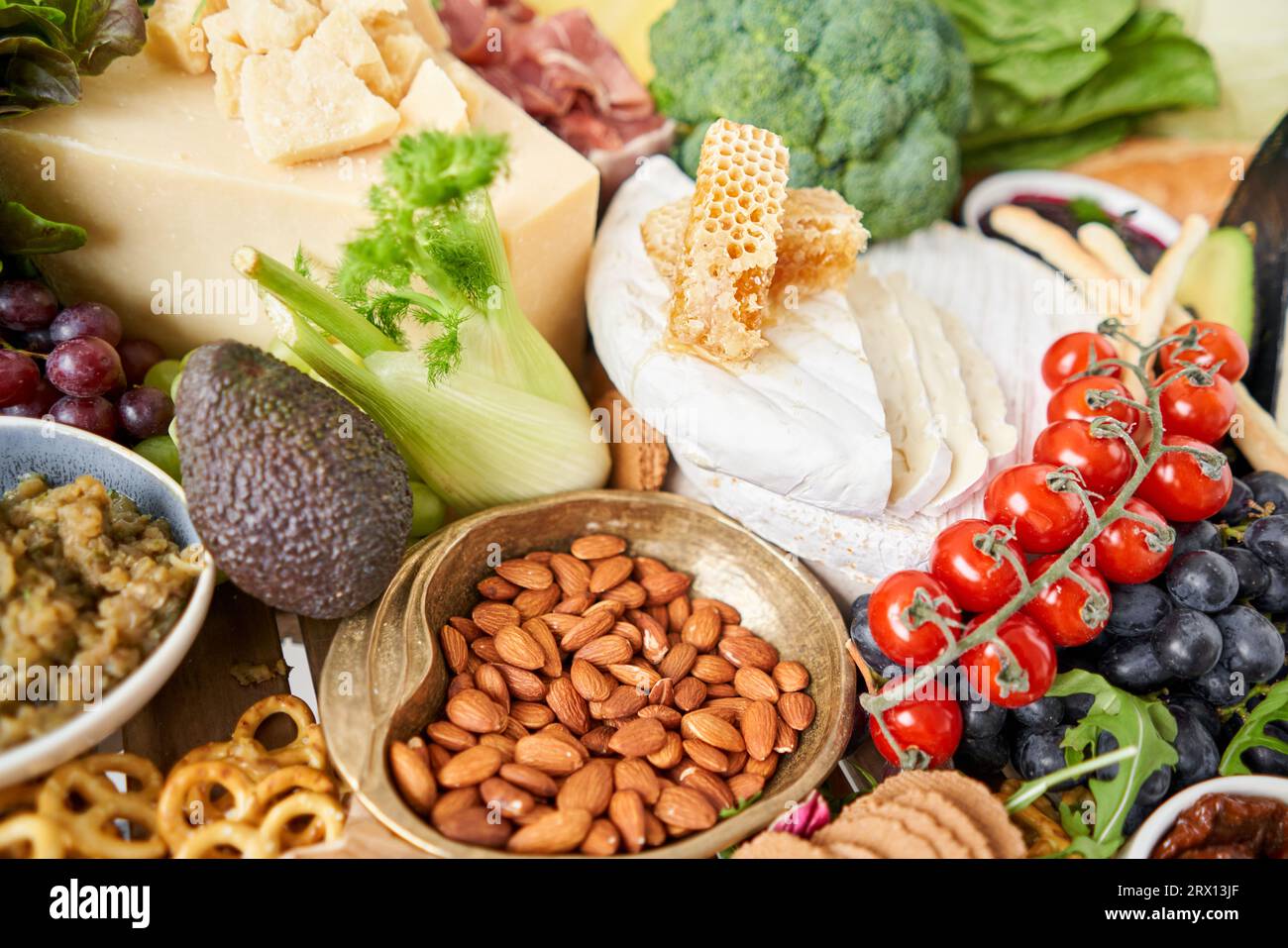 Table full of mediterranean appetizers, tapas or antipasto. Assorted ...