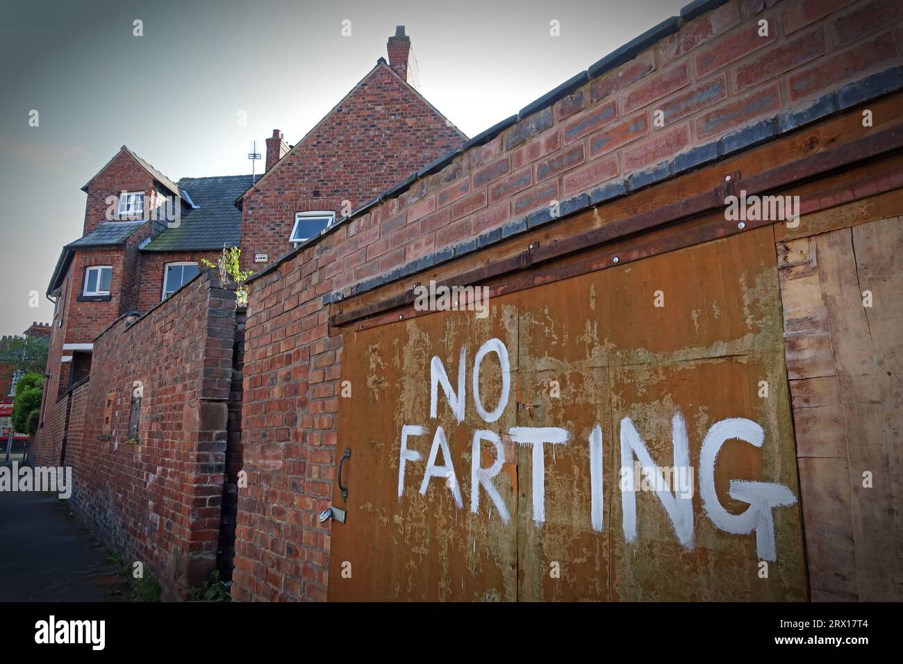 Flatulance problems, No Parking, No Farting, Heath St, Stockton Heath, Warrington, Cheshire, England, UK, WA4 6LP Stock Photo