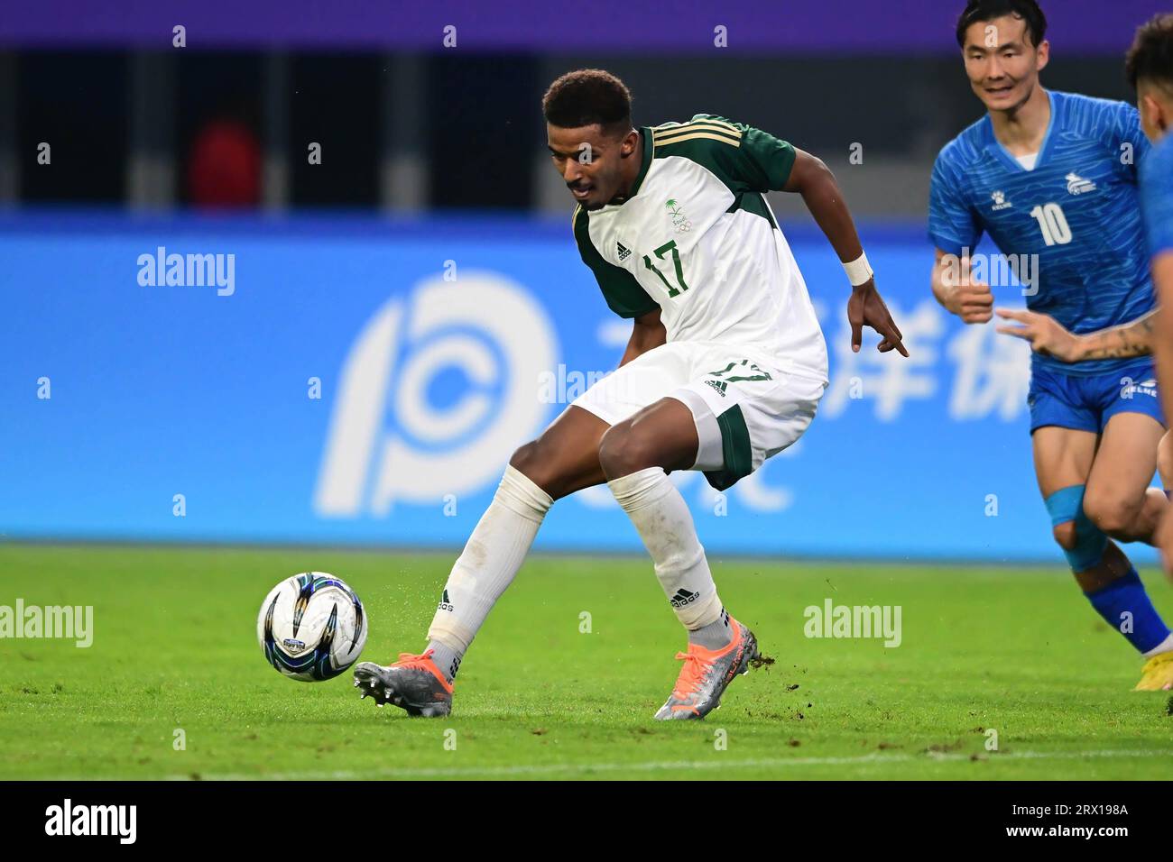 Hangzhou, China. 21st Sep, 2023. Haitham Mohammed A Asiri of the Saudi Arabia men football team seen in action during the 19th Asian Games 2023 men's football group round Group B match between Saudi Arabia and Mongolia at Linping Sports Centre Stadium. Final score; Saudi Arabia 3:0 Mongolia. Credit: SOPA Images Limited/Alamy Live News Stock Photo