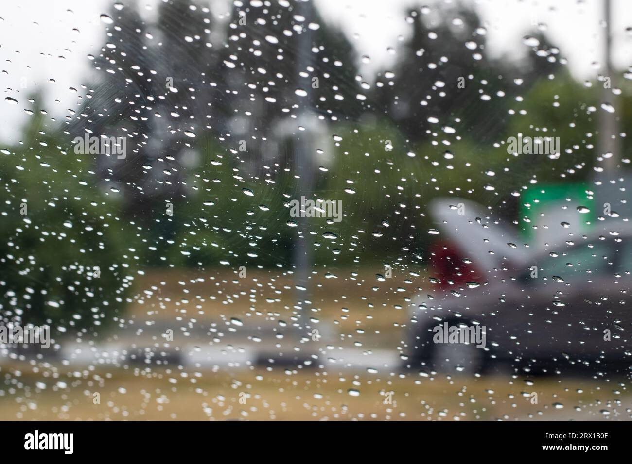 Rainy windy raindrops on glass hi-res stock photography and images - Alamy