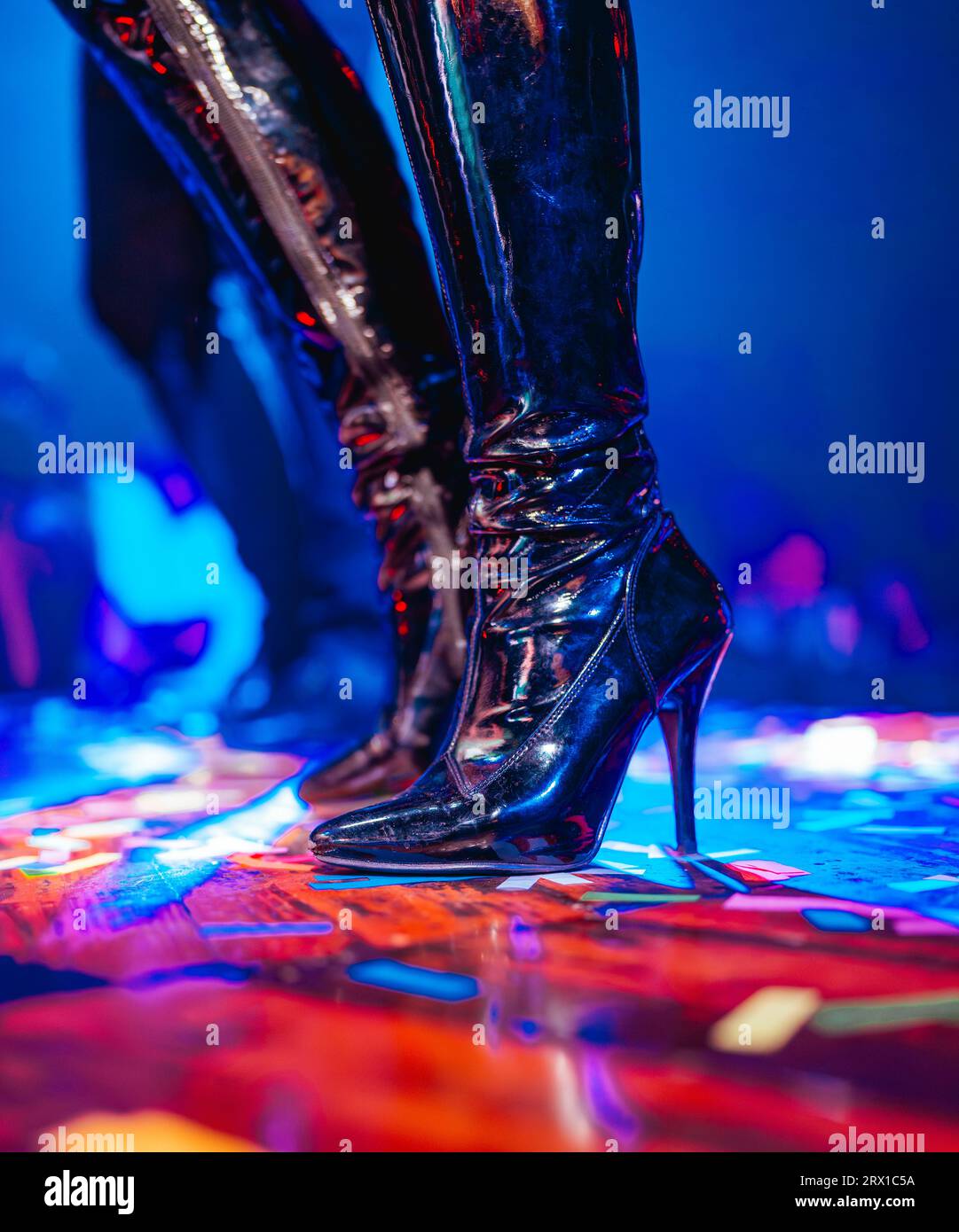 women's boots heels dance party celebration Stock Photo