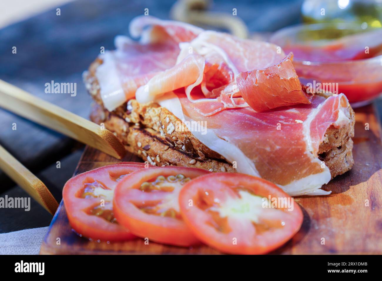 closeup of a typical Spanish toast with ham and tomato Stock Photo Alamy