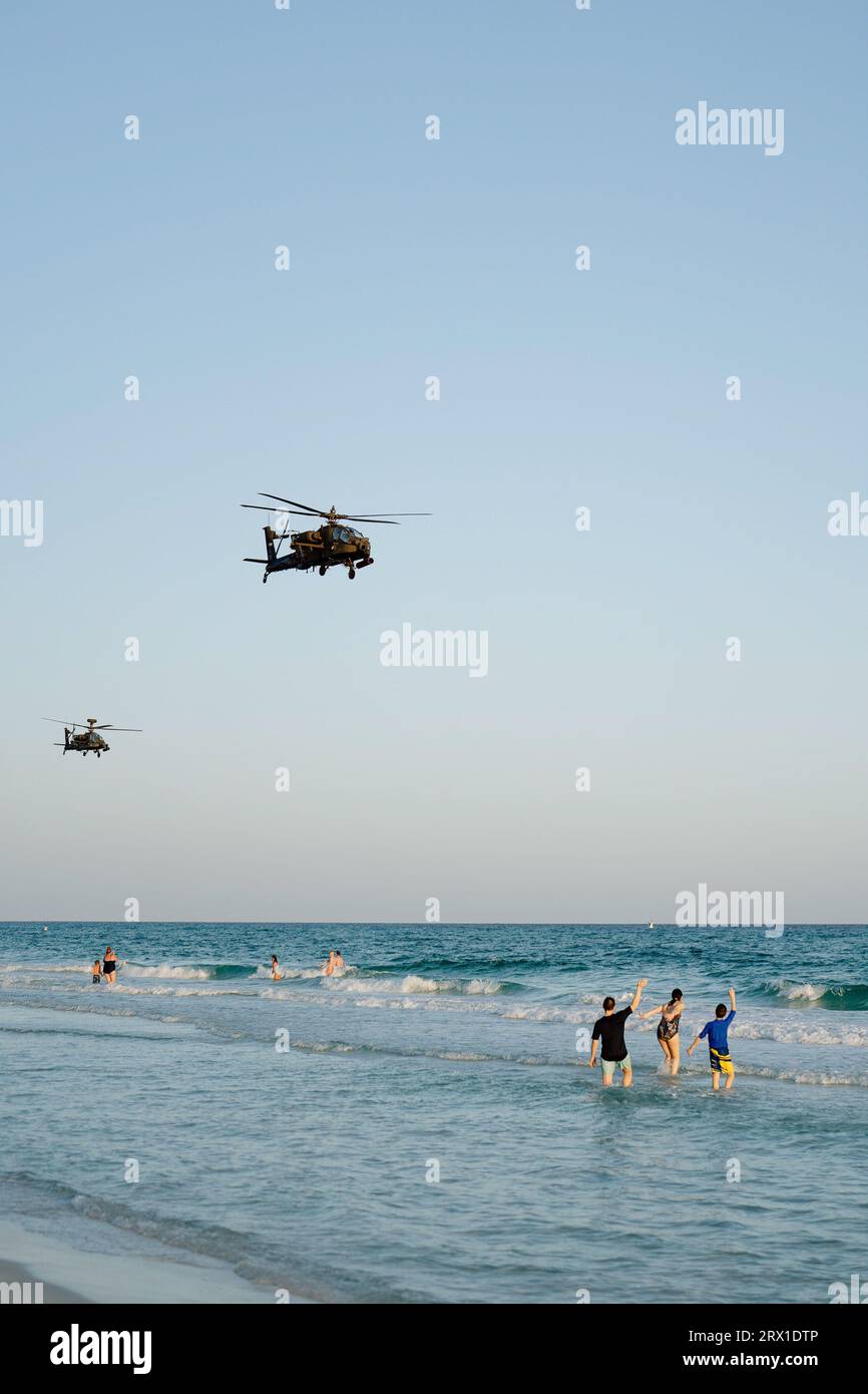 Beachgoers waving to Helicopters, coronado beach April 26th, 2023 Stock Photo