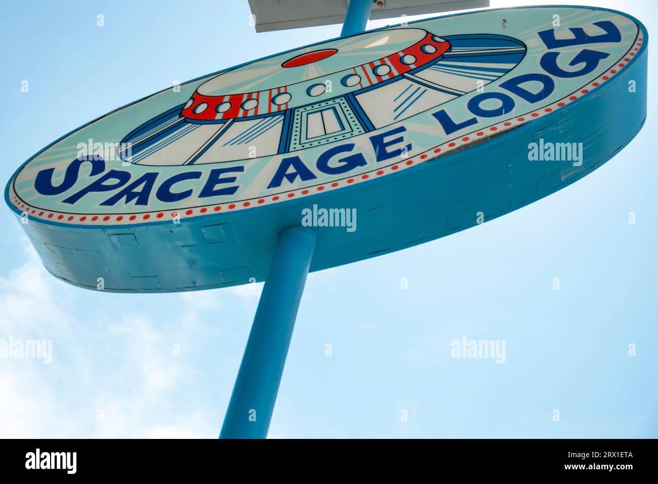 Space Age Lodge round UFO sign Stock Photo