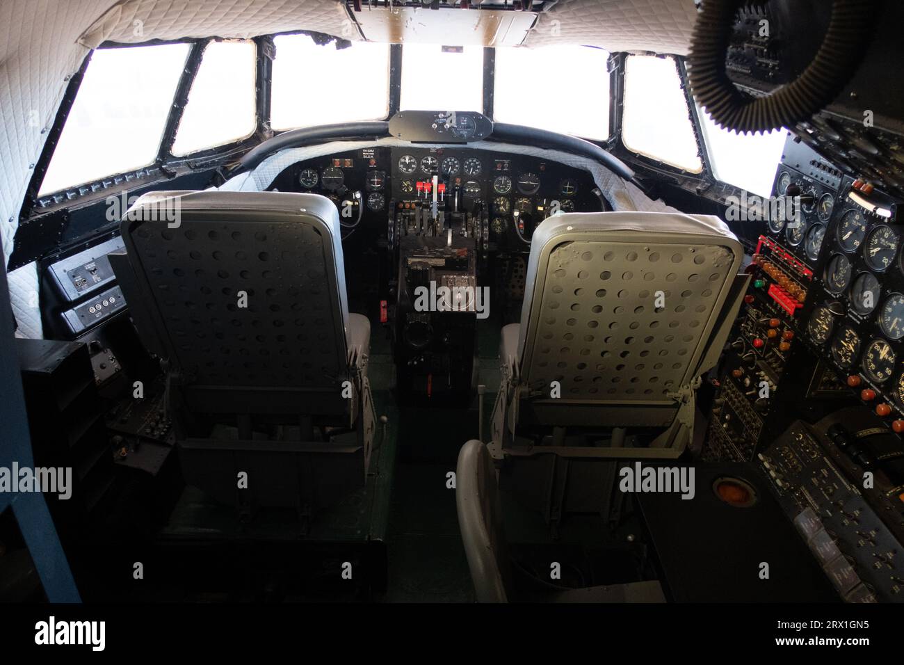 flight deck and flight controls of a Boeing 747 cockpit in an airplane in Queensland Australia Stock Photo