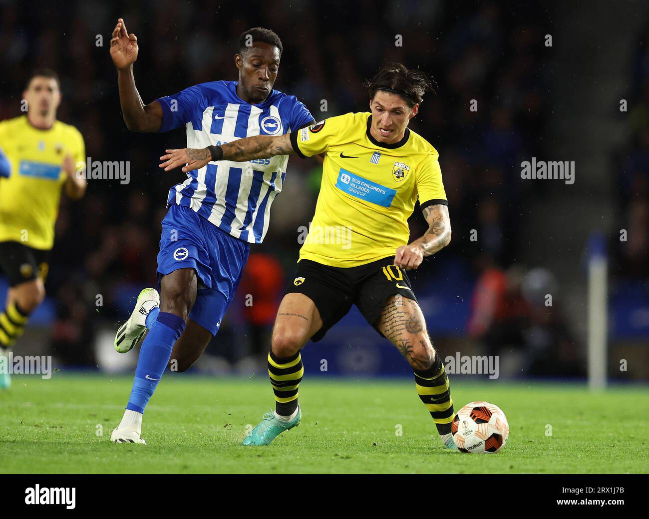 Brighton and Hove, UK. 21st Sep, 2023. Danny Welbeck of Brighton and Hove Albion and Steven Zuber of AEK Athens challenge for the ball during the UEFA Europa League match at the AMEX Stadium, Brighton and Hove. Picture credit should read: Paul Terry/Sportimage Credit: Sportimage Ltd/Alamy Live News Stock Photo
