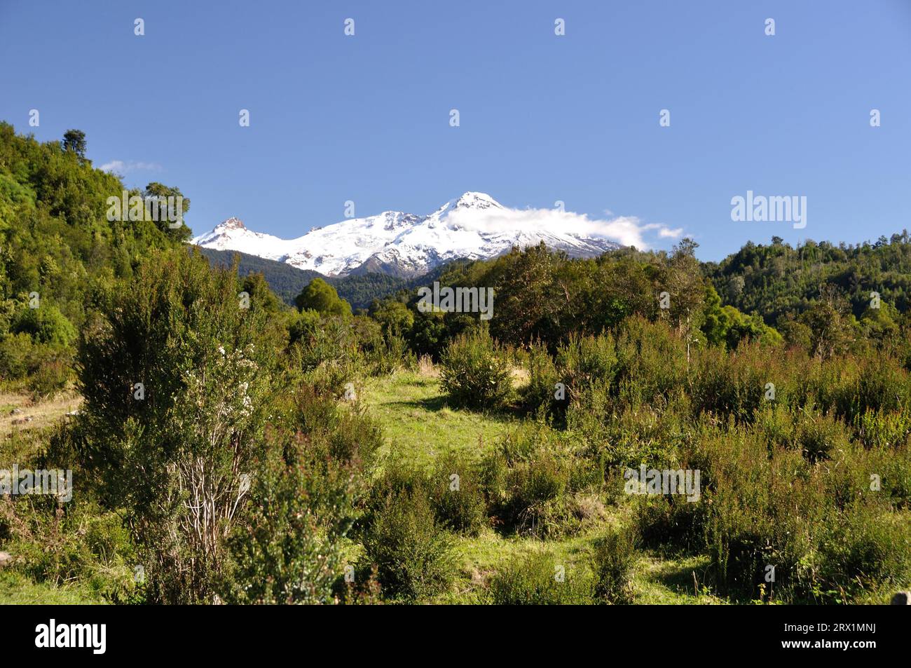 The summit of the snow-capped volcano Yate, Patagonia, Chile Stock Photo