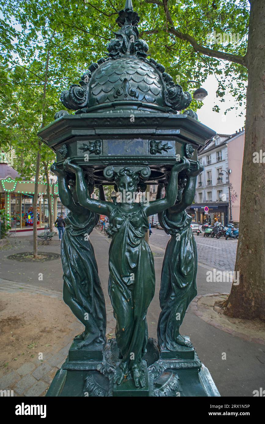 The Art Nouveau Wallace Fountain with Drinking Water, Paris, France Stock Photo