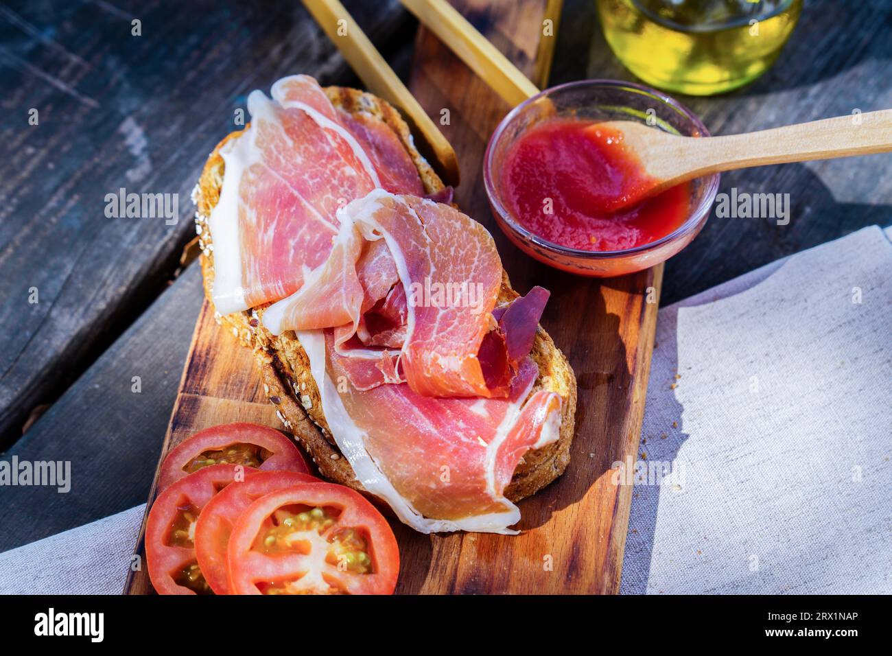 Top view of a typical Spanish breakfast of toast with virgin olive oil