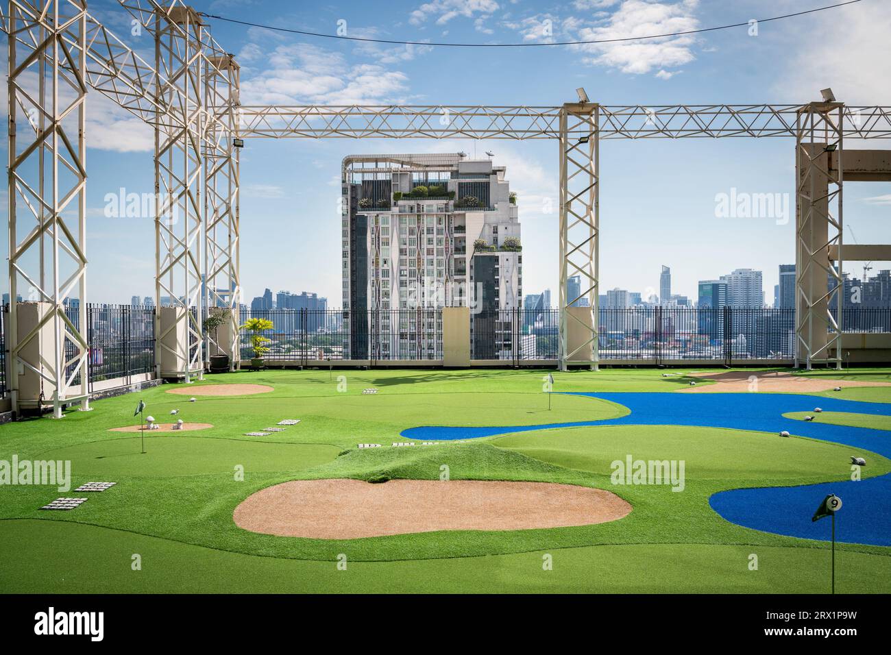 A golf putting course on the roof of The Baiyoke Sky Hotel in the Ratchathewi area of Bangkok, Thailand. Stock Photo