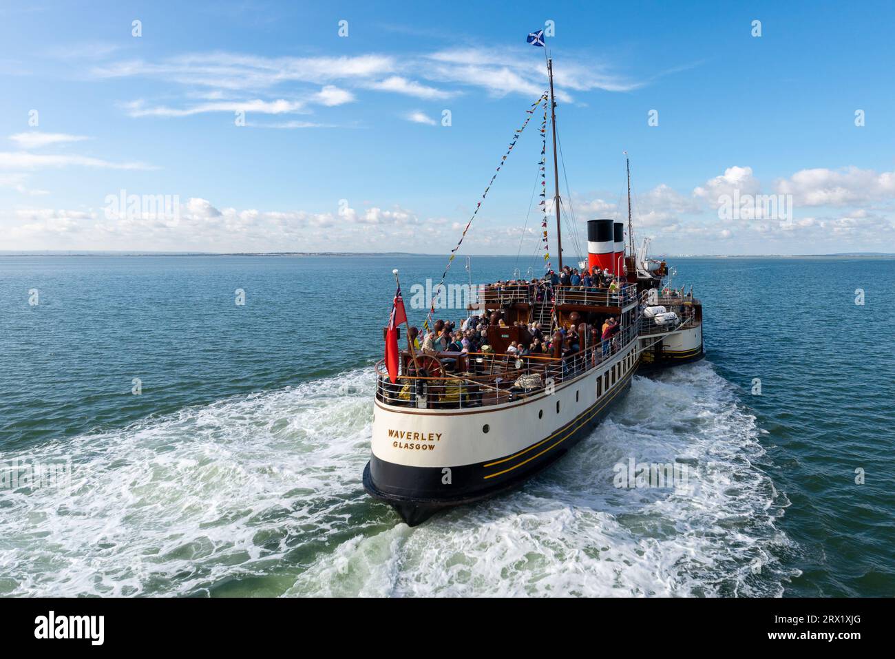 Southend Pier, Southend on Sea, Essex, UK. 22nd Sep, 2023. Launched in 1946, Waverley is the world’s last seagoing paddle steamer & has come alongside the pier at Southend on Sea to take passengers on board for a pleasure cruise out into the Thames Estuary to view the wartime forts. The trip is being promoted as being in celebration of Southend Pier being awarded Pier of the Year 2023, & the pier itself has wartime history in serving as HMS Leigh during the Second World War. Waverley has a program of trips on the Thames & into London in the upcoming weeks. Stock Photo