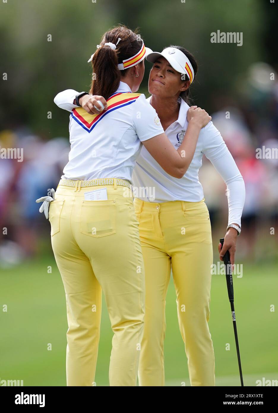 Europe's Celine Boutier (right) and Georgia Hall embrace on the 18th green after defeat during day one of the 2023 Solheim Cup at Finca Cortesin, Malaga. Picture date: Friday September 22, 2023. Stock Photo