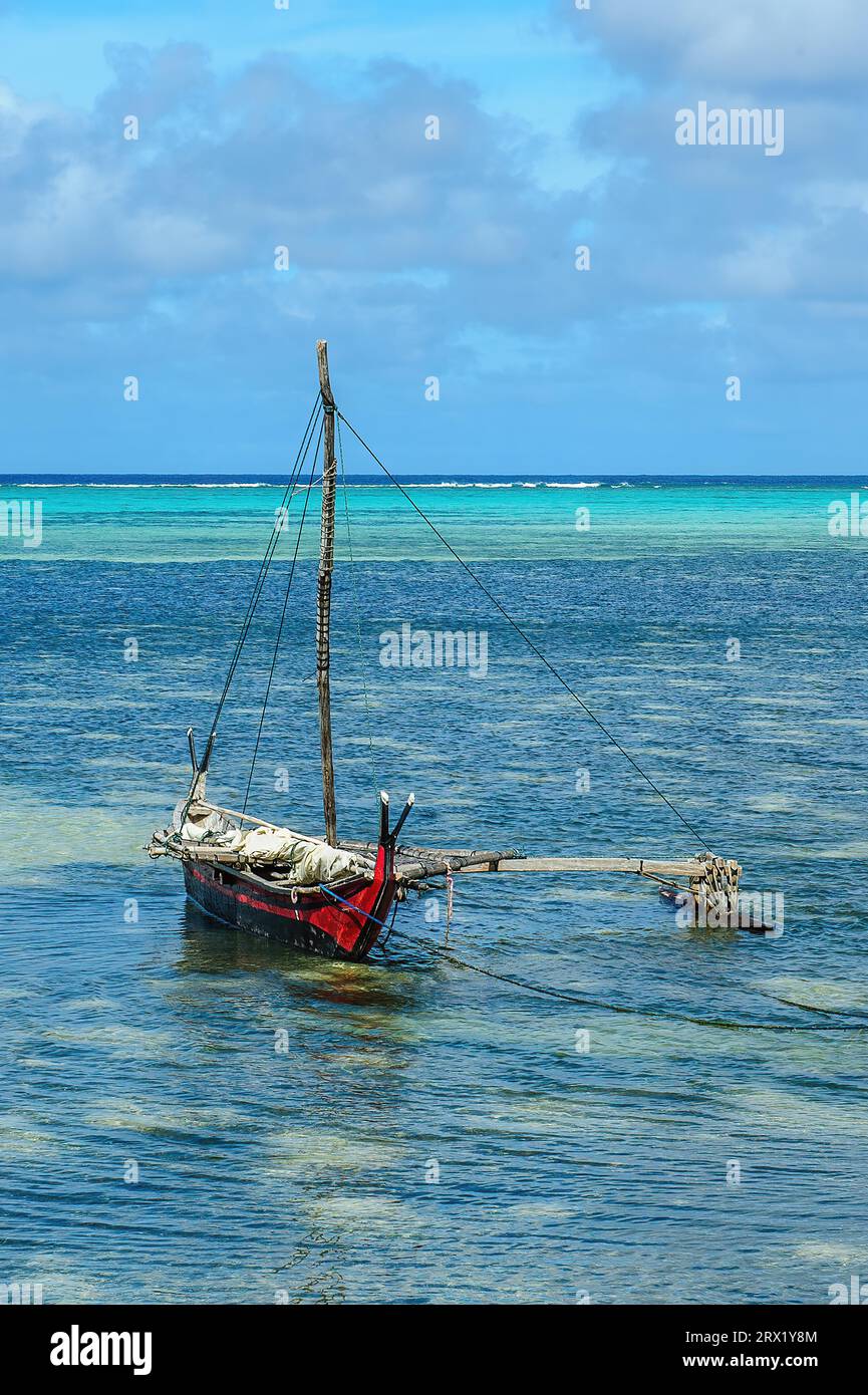 Traditionesses Dugout Canoe Dugout canoe lies in turquoise blue lagoon