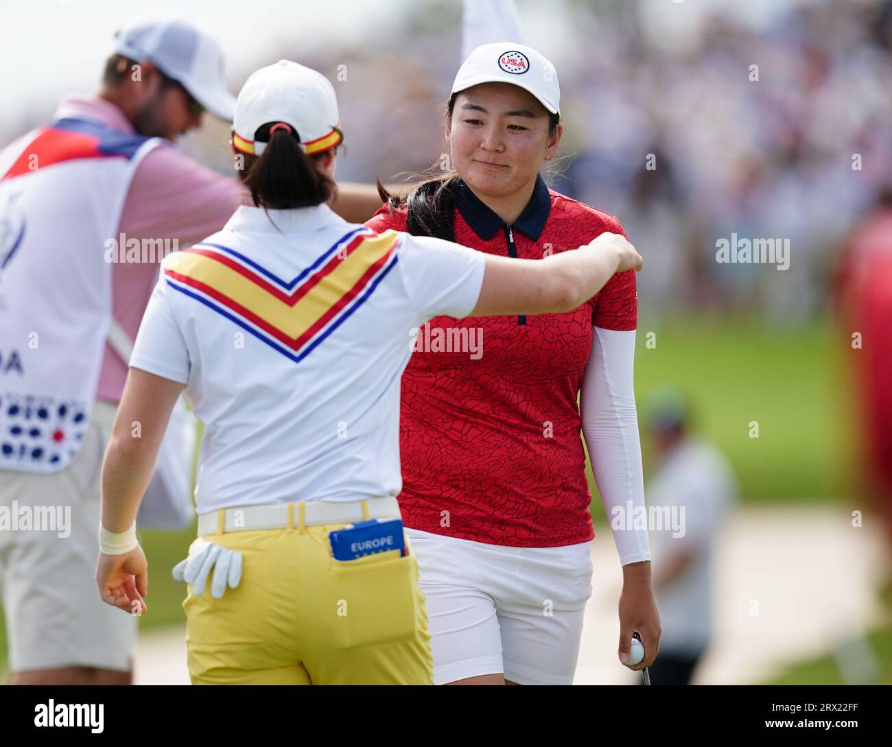 USA's Allisen Corpuz (right) embraces Europe's Leona Maguire after winning their match during day one of the 2023 Solheim Cup at Finca Cortesin, Malaga. Picture date: Friday September 22, 2023. Stock Photo
