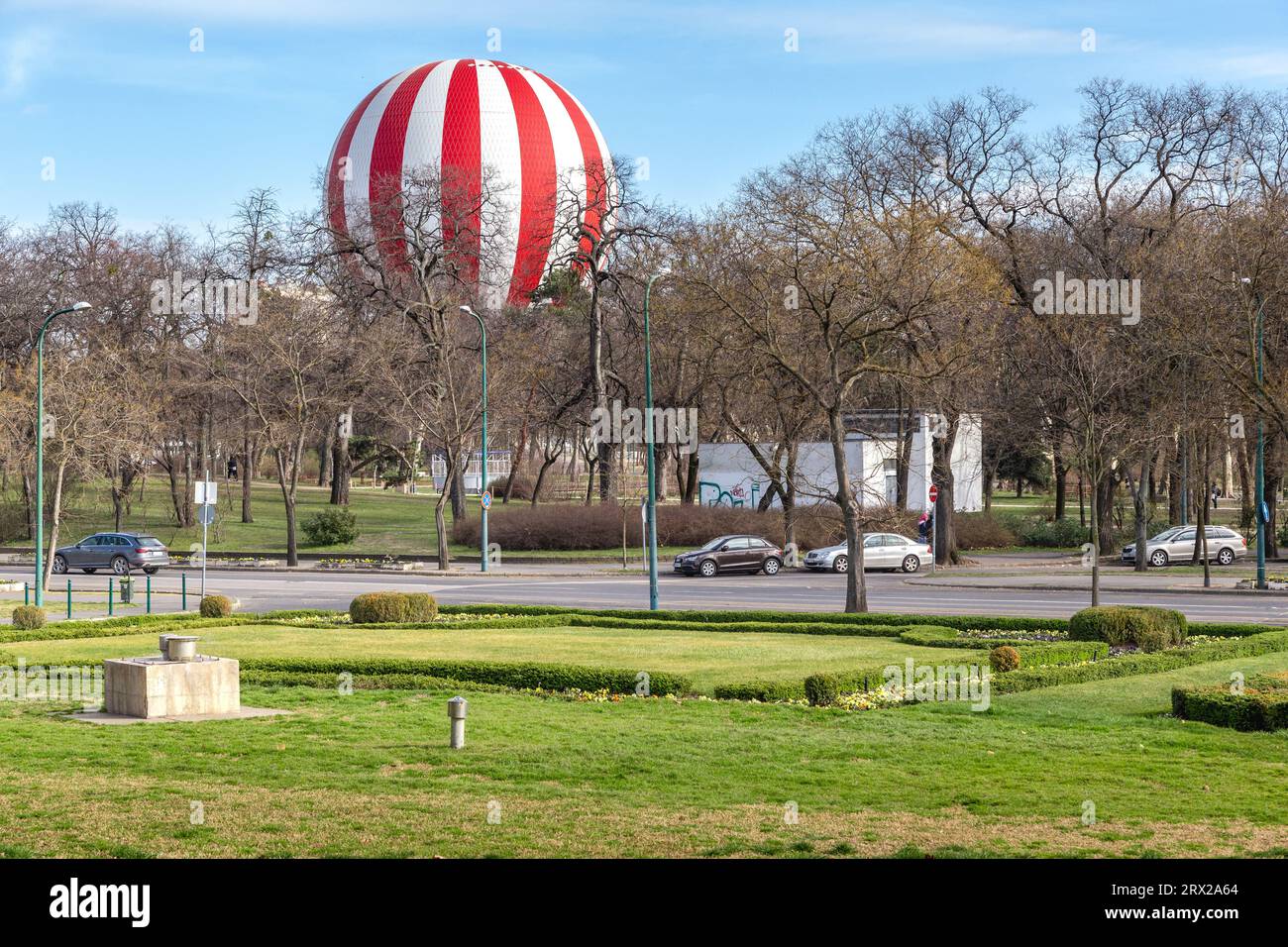 BUDAPEST, HUNGARY - MARTH 13, 2023: This is a fragment of the urban Varosliget Park with an attraction in a hot air balloon. Stock Photo
