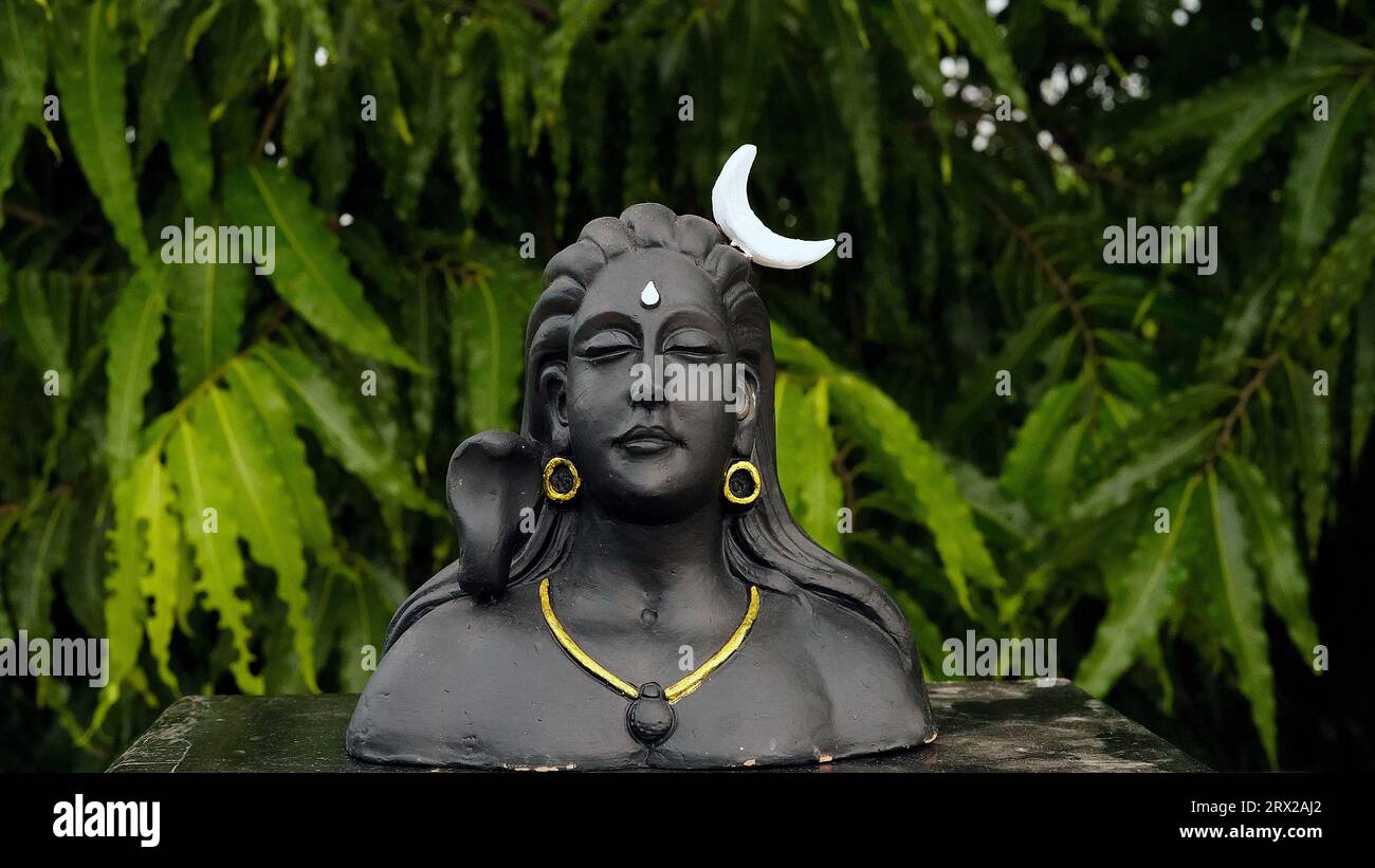 Lord Ganesha, Adiyogi and maa Durga Idol or statue isolated at green ...