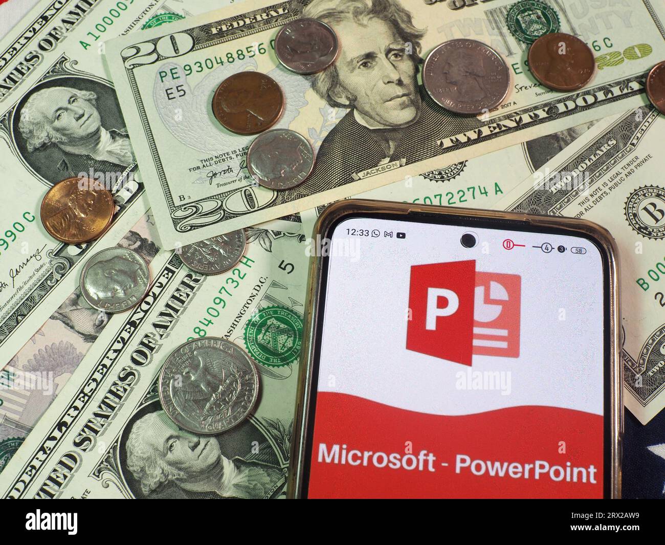 In this photo illustration, Microsoft PowerPoint logo seen displayed on a smartphone. Stock Photo