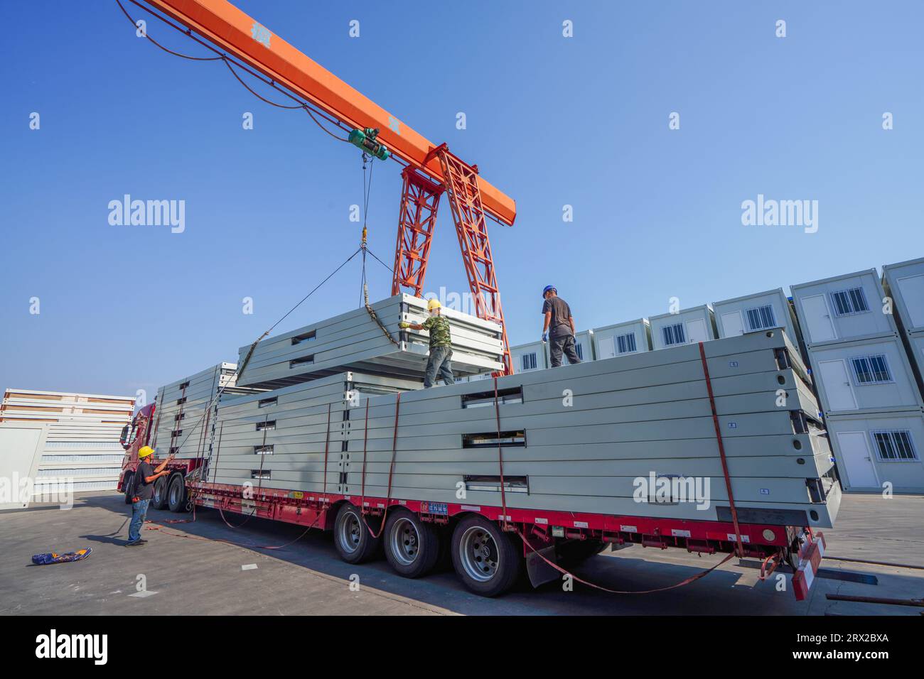 Luannan County, China - September 21, 2022: Workers load and transport in the lifting box room, North China Stock Photo